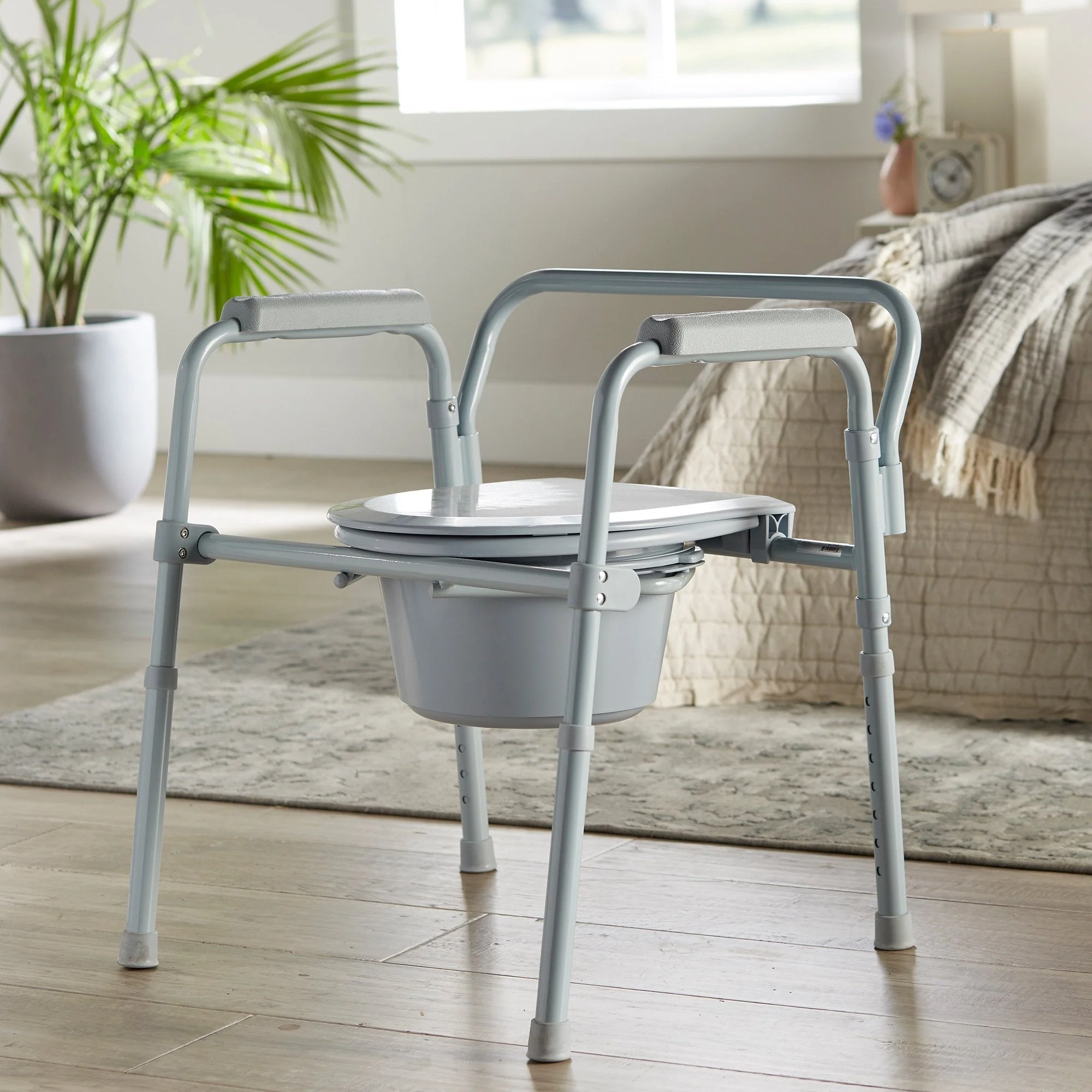 McKesson Folding Fixed Arm Steel Commode Chair - Image 10